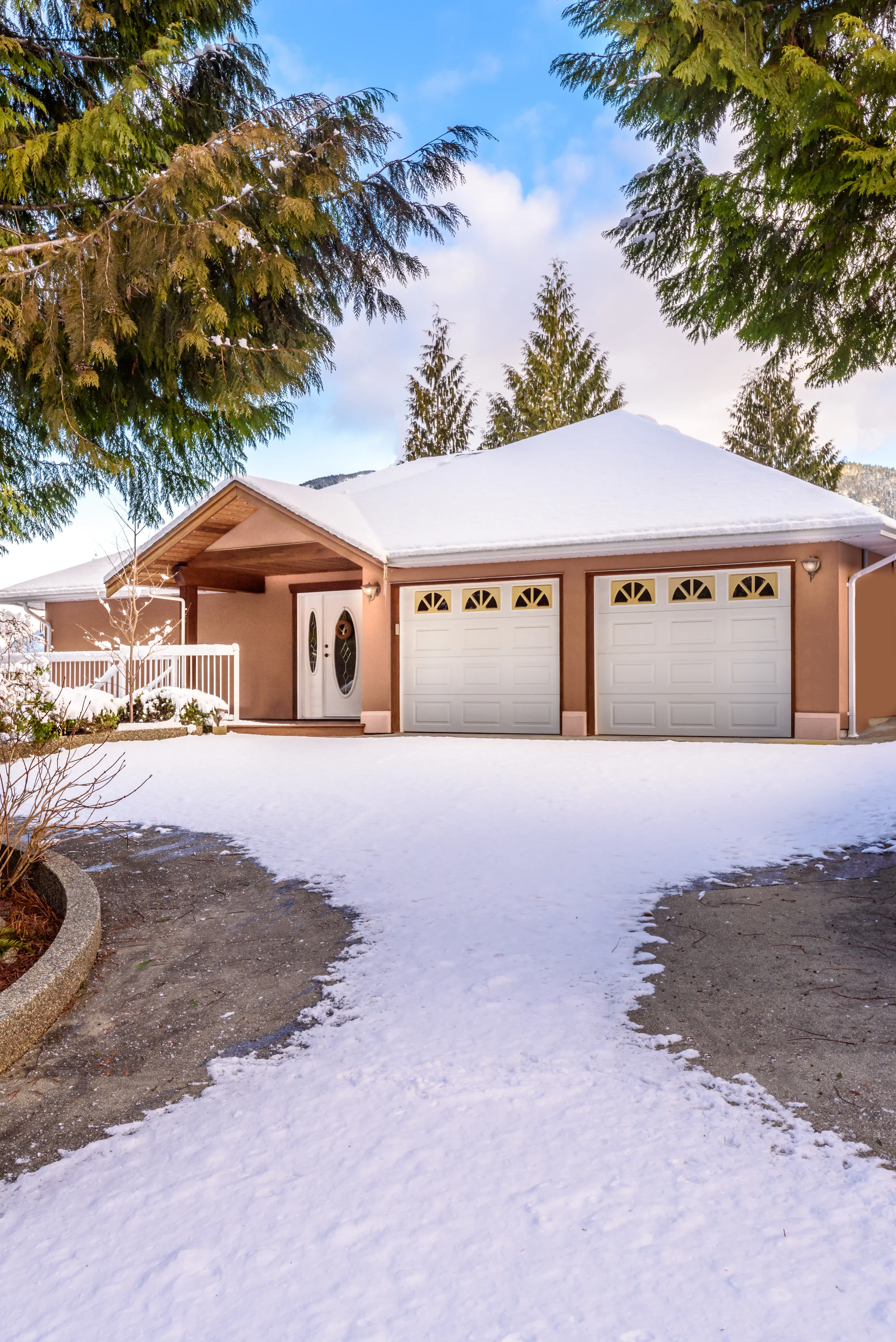 Freshly plowed driveway at a Woodbury, MN home after a snowfall